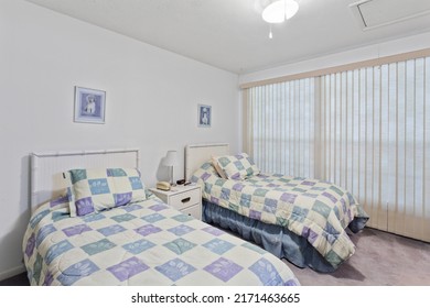 Keystone Heights, Florida USA - June 25, 2022: Spare Bedroom With Two Twin Beds