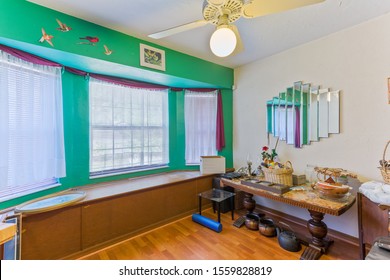 Keystone Heights, Florida / USA - November 13 2019: Cluttered Office Space With Bay Window