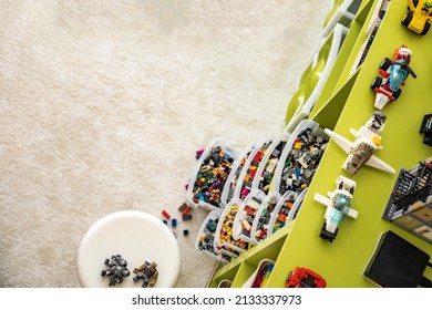 Khabarovsk, Russia, February 18, 2022. Lego Vertical Storage System At Children's Room. Sorted Multicolored Parts. Much Neatly Folded Plastic Blocks In Drawer Cases At Cupboard. Housework Cleanup