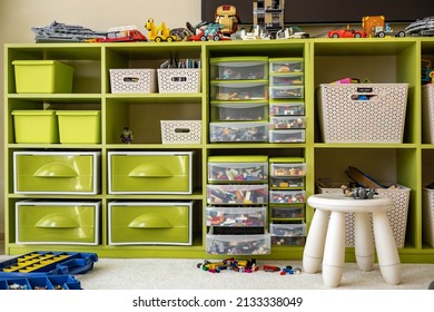 Khabarovsk, Russia, February 18, 2022. Lego Vertical Storage System At Children's Room. Sorted Multicolored Parts. Much Neatly Folded Plastic Blocks In Drawer Cases At Cupboard. Housework Cleanup