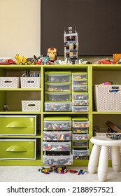 Khabarovsk, Russia, February 18, 2022. Lego Vertical Storage System At Children's Room. Sorted Multicolored Parts. Much Neatly Folded Plastic Blocks In Drawer Cases At Cupboard. Housework Cleanup