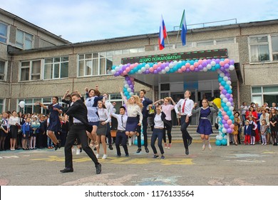 Khabarovsk, Russia - September 01, 2018:  Senior Pupils Dancing On The School's Solemn Line. Polytechnic Lyceum. Khabarovsk, Far East, Russia.