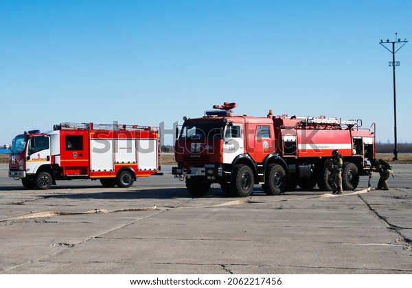 \
Khabarovsk Khabarovsk\
Territory Russia 10 20 2021 Exercise to rescue victims from a\
crashed plane. Firefighters pour foam on airplane fezulage, prepare\
teknika for\
extinguishing