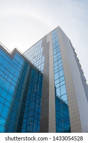 Khabarovsk,Russian Federation - 05.04.2019: Modern Grey Office Building With Blue Windows.