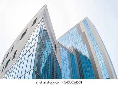 Khabarovsk,Russian Federation - 05.04.2019: Modern Grey Office Building With Blue Windows.