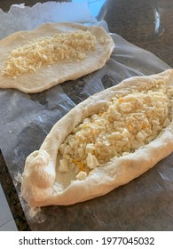 Khachapuri Before Baking In Oven. Top View Of Dough With Feta Chees