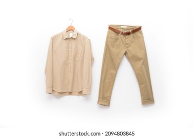 Khaki Pants Closeup With Long Sleeved Shirt On Hanging