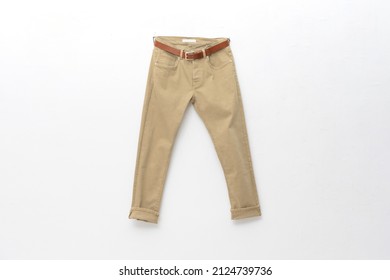 Khaki trousers with belt  closeup on white background

 - Shutterstock ID 2124739736