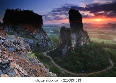 Khao Kuha at Songkhla.South Thailand Mountain hill with green forest trees on sunrise blur background,Unseen thailand - Shutterstock ID 2230834513