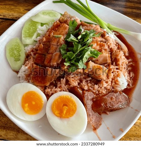 Khao Moo Dang  in Thailand  so tasty yummy  Rice with pork  red sauce