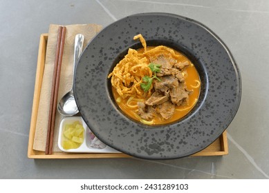 Khao soi or khao soy is a Chin Haw dish served in northern Thailand and Laos (a similar dish, ohn no khao swe, is widely served in Myanmar) in Chonburi Province, Thailand, Asia