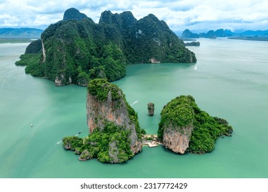Khao Tapu, James Bond Island, aerial shot from a drone, blue sea, emerald green, is a popular tourist attraction in Southern Thailand.
