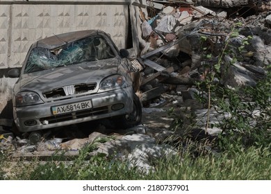 Kharkiv, Kharkiv Oblast. Saltivka. A Car And Building Hit By A Russian Missile. June 21, 2022