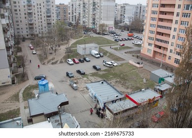 Kharkiv, Ukraine, 4 2 2017 The View To The Yard Of Ordinary City Neighbourhood, Soviet Buildings, The People Doing Shopping 