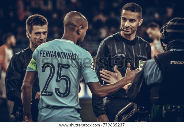 KHARKIV, UKRAINE - December 06,\
2017: Team captains shake hands before the UEFA Champions League\
match between Shakhtar Donetsk vs Manchester City (England),\
Ukraine