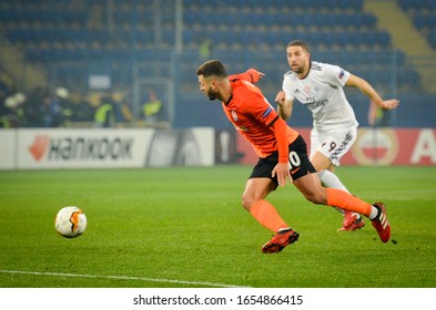 KHARKIV, UKRAINE - Febriary 20, 2020: Junior Moraes And Adel Taarabt During The UEFA Europe League Match Between Shakhtar Donetsk Vs SL Benfica (Portugal), Ukraine