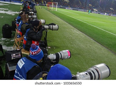 KHARKIV, UKRAINE - FEBRUARY 21, 2018: Sport Photographers At Work During UEFA Champions League Round Of 16 Game Shakhtar V Roma At OSK Metalist Stadium In Kharkiv, Ukraine