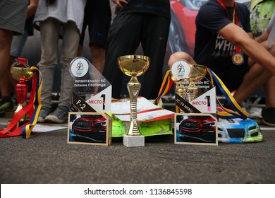 KHARKIV, UKRAINE - JULY 15, 2018: Awards Ceremony. Radio-controlled Car Movement. RC Touring Car Rally Race On The Asphalt Ground. Kharkiv RC Extreme Challenge 2018