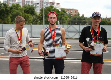 KHARKIV, UKRAINE - JULY 15, 2018: Awards Ceremony. Radio-controlled Car Movement. RC Touring Car Rally Race On The Asphalt Ground. Kharkiv RC Extreme Challenge 2018