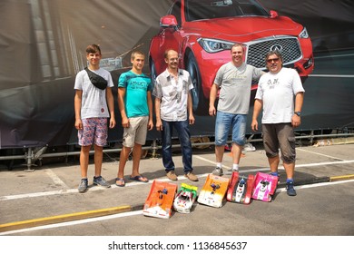 KHARKIV, UKRAINE - JULY 15, 2018: Awards Ceremony. Radio-controlled Car Movement. RC Touring Car Rally Race On The Asphalt Ground. Kharkiv RC Extreme Challenge 2018