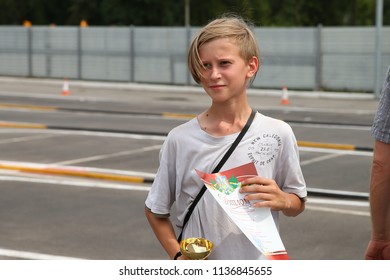 KHARKIV, UKRAINE - JULY 15, 2018: Awards Ceremony. Radio-controlled Car Movement. RC Touring Car Rally Race On The Asphalt Ground. Kharkiv RC Extreme Challenge 2018