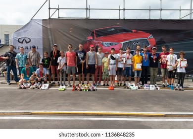 KHARKIV, UKRAINE - JULY 15, 2018: Awards Ceremony. Radio-controlled Car Movement. RC Touring Car Rally Race On The Asphalt Ground. Kharkiv RC Extreme Challenge 2018