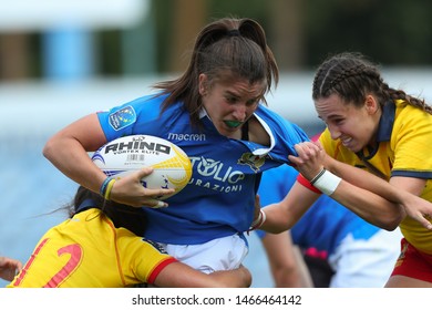 KHARKIV, UKRAINE - JULY 20, 2019: Rugby Europe Women's Sevens Grand Prix Series. Match Between Spain And Italy. Challenge For The Ball Using A High Tackle