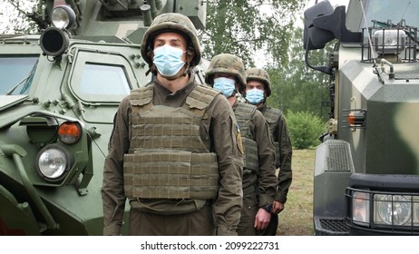 Kharkiv, Ukraine - May 29, 2021: Soldiers Of The National Guard In Body Armor Near The Armored Vehicle