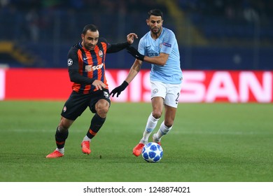 KHARKIV, UKRAINE - OCTOBER 22, 2018: Challenge For The Ball Between Riyad Mahrez And Ismaily. UEFA Champions League Shakhtar-Manchester City.