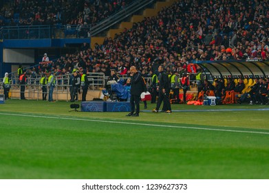 KHARKIV, UKRAINE - OCTOBER 23, 2018: Manchester City Manager Josep Guardiola On Side Of Field. Corrected The Game.