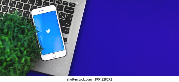 Kharkov, Ukraine - 26 January, 2021: Logo Of Twitter Social Network Application On Apple IPhone, Flat Lay Banner, Mockup, Workplace And Copy Space Photo