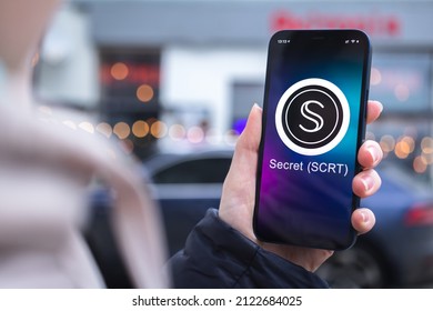 Kharkov, Ukraine - February 2, 2022: Secret SCRT Coin Symbol. Trade With Cryptocurrency, Digital And Virtual Money, Mobile Banking. Hand With Smartphone, Screen With Crypto Icon Close-up