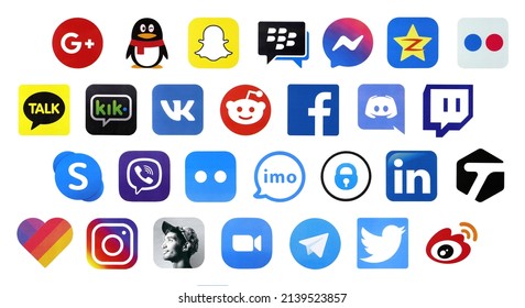 KHARKOV, UKRAINE - FEBRUARY 24, 2021: Many icons of popular social networks and online messengers printed on white paper. Logos of modern communication portals and smartphone apps