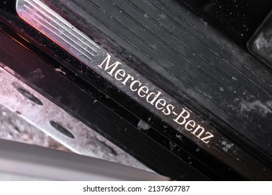 Kharkov, Ukraine - March 14, 2022: Mercedes Benz Logo Inside The Interior Of Luxury Car. Winter And Snow Background