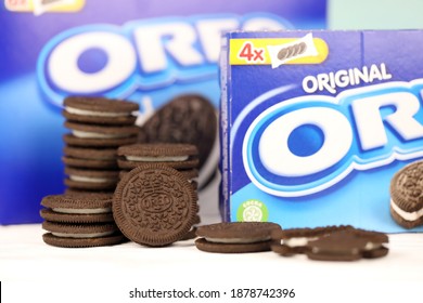 KHARKOV, UKRAINE - NOVEMBER 24, 2020: Oreo sandwich cookies and blue product boxes on white table. Oreo is a sandwich cookie with a sweet cream is the best selling cookie in the US