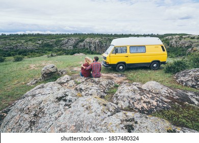 Kherson, Ukraine - June 2020: Eastern European Couple Travelling By Yellow Camper Van Though The Countryside.