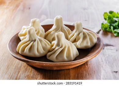 Khinkali Cooked On A Ceramic Plate