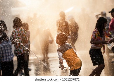 Khon Kaen, Thailand - April 14: Let's play with water gun water gun was the splashing water on each other in Songkran Festival at Khao Niew Road, Khon Kaen City on April 14, 2018.
