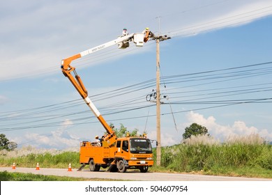 Khonkaen - Thailand , October 26 - 2016 : Electrical truck service and maintenance for high voltage line in Thailand electrical system.