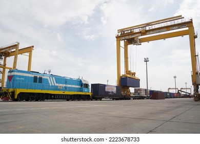 Khorgos, Kazakhstan - 09.22.2022 : Unloading Of Cargo Containers In The Dry Port Of Khorgos.