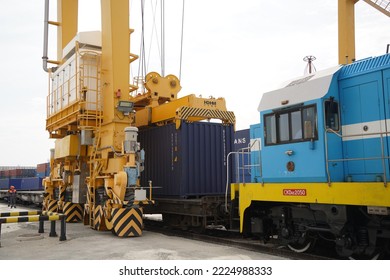 Khorgos, Kazakhstan - 09.22.2022 : Unloading Of Cargo Containers In The Dry Port Of Khorgos.