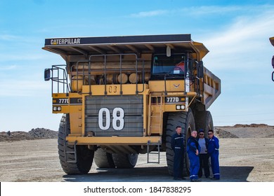 Khromtau/Kazakhstan May 06 2012: Copper ore open-pit mining (quarry). Caterpillar quarry machine (dump truck).