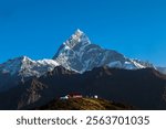 KHUMAI DADA is must popular trekking place in Nepal. 
This is mt. Fishtail from Khumai dada. Where you can see other mountain like Annapurna, Mardi, S. Annapurna, Himchuli and others differents peak. 