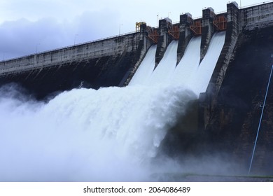 Khun Dan Prakarnchon Dam Water Overflow From Spillway