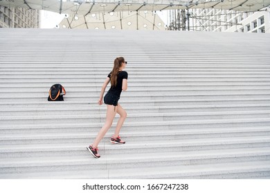 Kick Feet Up And Go. Energetic Woman Climb Stairs Outdoors. Active Life. Freedom From Care. Free And Carefree. Freedom. Symbol Of Freedom. Travel And Wanderlust. Freedom To Explore. I Wanna Get High.