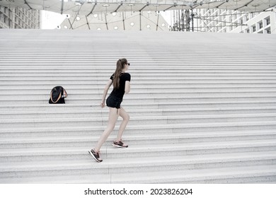 Kick Feet Up And Go. Energetic Woman Climb Stairs Outdoors. Active Life. Freedom From Care. Free And Carefree. Freedom. Symbol Of Freedom. Travel And Wanderlust. Freedom To Explore. I Wanna Get High