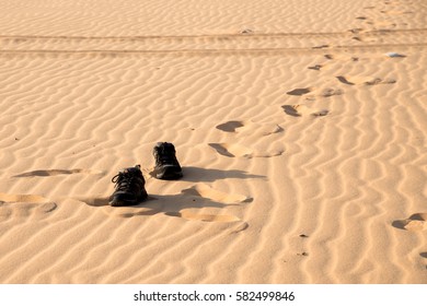 Kick Off Shoes And Walk On White Sand.