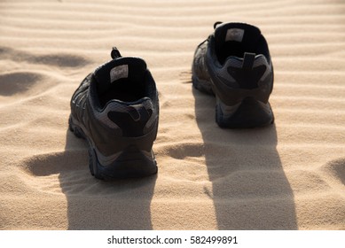 Kick Off Shoes And Walk On White Sand.