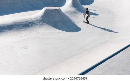 Kick Scooter Riding In An Urban Skate Park