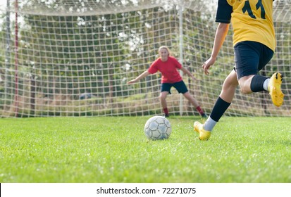 kicking and  Defending in soccer - Powered by Shutterstock